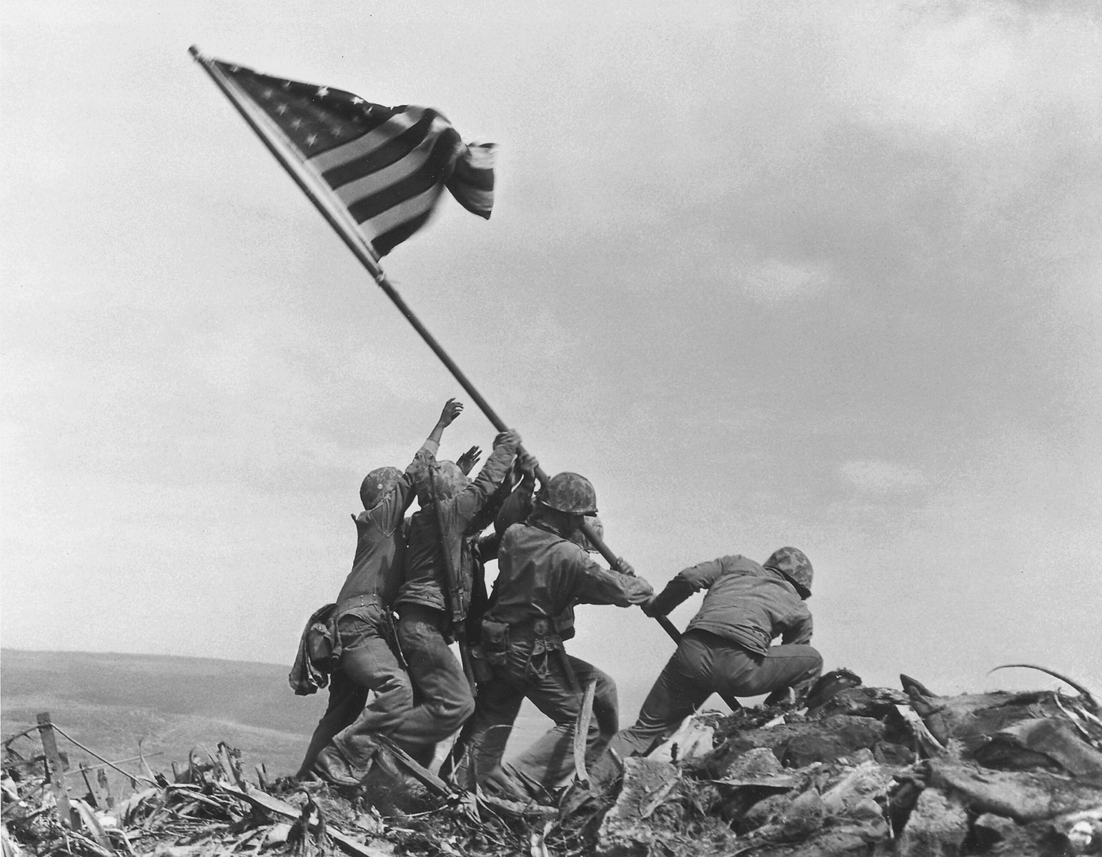 10. “Raising the Flag on Iwo Jima” – Joe Rosenthal (1945) (image credits: wikimedia)