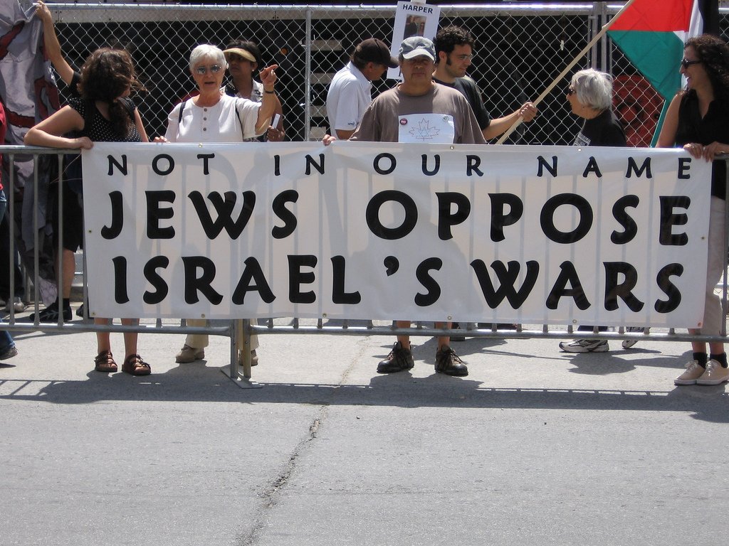 The “Not In Our Name” Movement (image credits: By https://www.flickr.com/photos/91521874@N00/, CC BY 2.0, https://commons.wikimedia.org/w/index.php?curid=7375592)