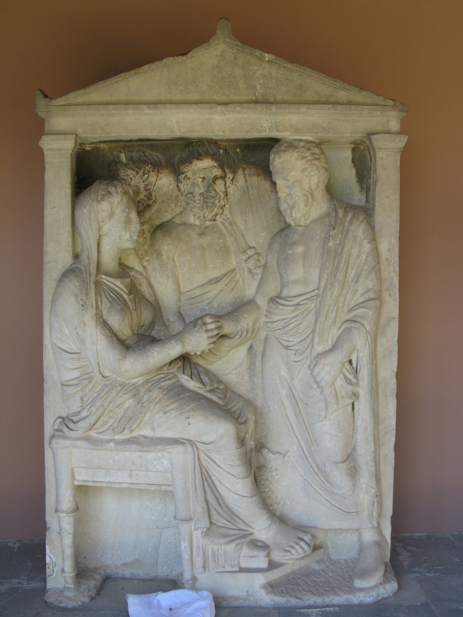 The Ancient Greek Handshake: A Symbol of Peace and Equality (image credits: Kerameikos, Ancient Graveyard, Athens, Greece

Uploaded by Marcus Cyron, CC BY 2.0, https://commons.wikimedia.org/w/index.php?curid=30177136)
