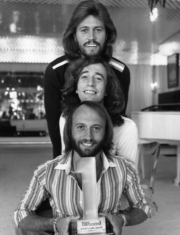 6. "How Deep Is Your Love" - Bee Gees (1977) (eBay item
photo front

photo back, Public domain)