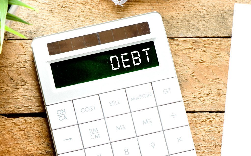 Avoid Debt Like It's a House Fire (mikecohen1872, Flickr, CC BY 2.0)