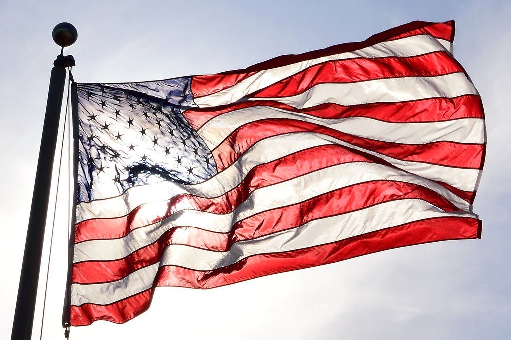 Flags Waving on Every Corner (Ken_KMF Strategies, Flickr, CC BY 2.0)
