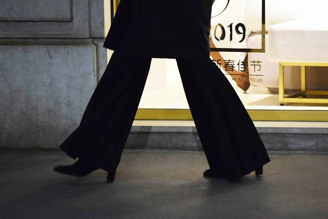 3. Wide-Leg Trousers and a Slim Knit Top (Image Credits: Unsplash)