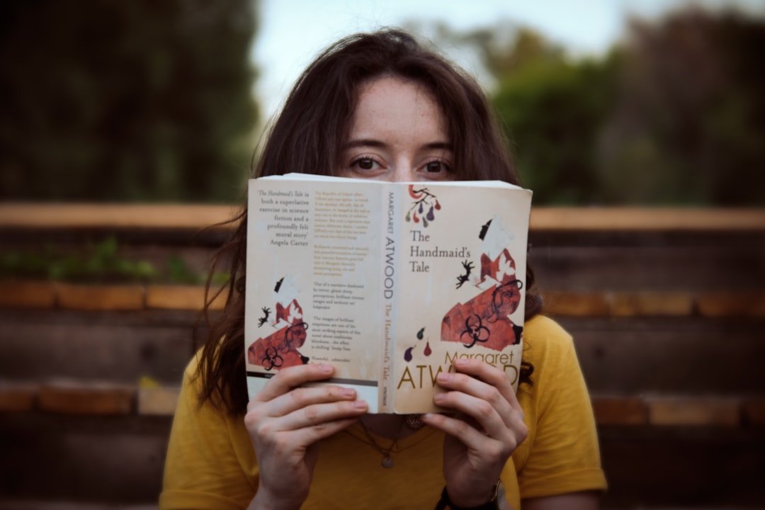 The Handmaid's Tale by Margaret Atwood - Red as a Warning Signal (Image Credits: Unsplash)