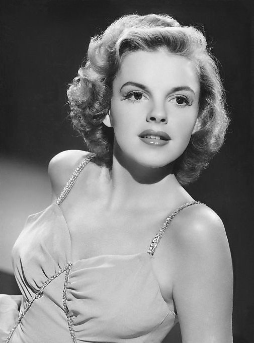 9. Judy Garland and MGM's Pill Regime: Childhood Stardom at a Devastating Price (eBay itemphoto frontphoto back

Same photo published in ad on page 138 of Billboard 1944 Music Yearbook, without copyright notice specific to ad (and hence PD-no-notice)., Public domain)