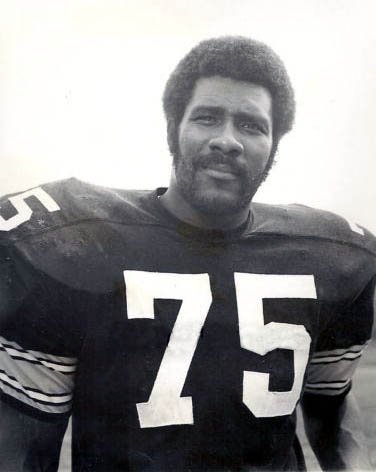 Coca-Cola “Mean Joe Greene” (1979) (ebay.com, front of photo, back of photo, Public domain)